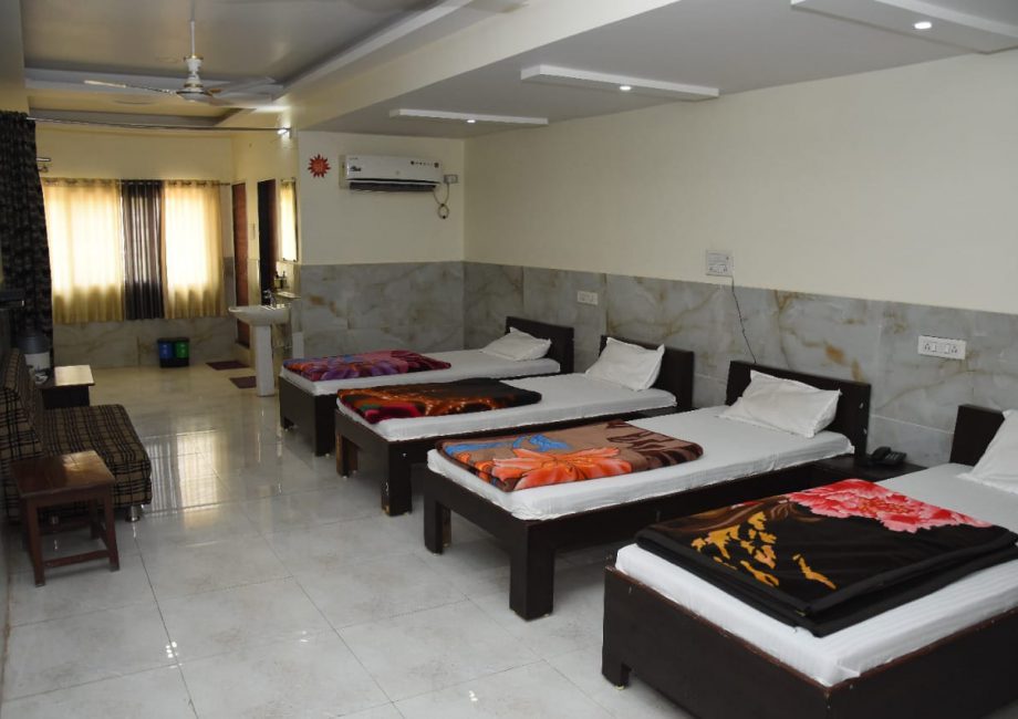 Basic AC room with 3 single beds at Reddy Sathram Seva Sadan Srisailam – Ideal for pilgrims and groups