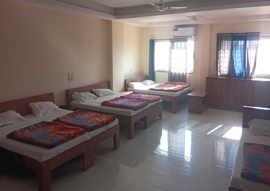 Basic AC room with 7 single beds at Reddy Sathram Seva Sadan Srisailam – Group accommodation for pilgrims